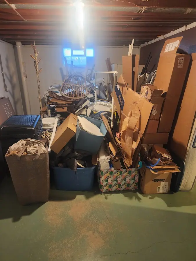 Roll-off dumpster container at job site for 2 Yard Dumpster Rental in Bonner Springs